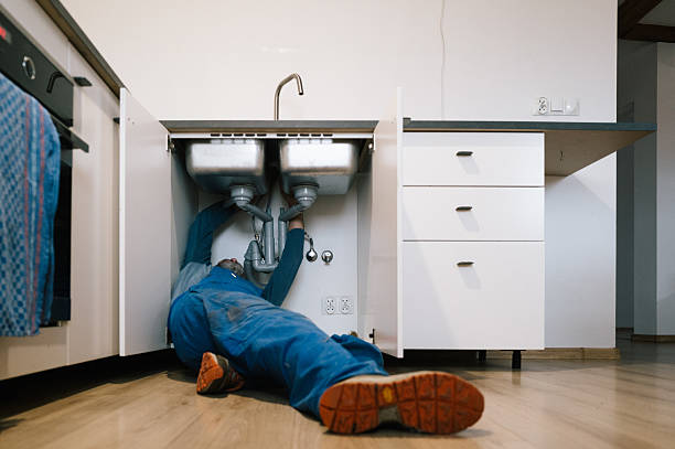 Professional Emergency Plumber technician working in Forestville, MD